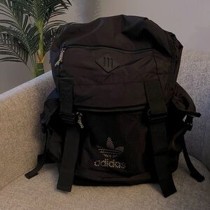 holographic mini backpack target GK product details might be BOGO: 'The Outdoor Hiking swatchColorName:Black Leather Color:Silk Chocolate